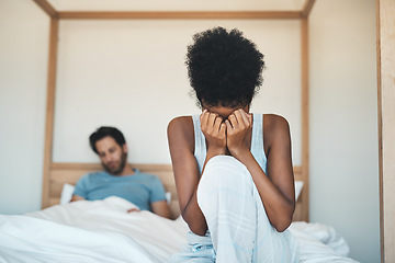 Image showing Couple, divorce and fight on bed in disagreement, argument or conflict in toxic relationship at home. Sad woman crying, cheating man person or partner in unhappy marriage or infertility in bedroom