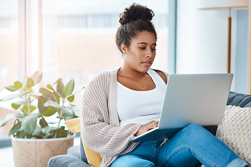 Image showing Woman, laptop and on home sofa while typing email or communication. Real female person relax on a couch with internet connection and tech to chat on social media, website or do online shopping