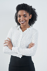 Image showing Happy, business and portrait of black woman with arms crossed in studio isolated on a white background. Smile, confidence and face of female professional, entrepreneur or person from South Africa.