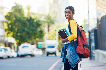 Image showing City walk, books and portrait woman, happy student or person on commute journey to university, college or high school. Outdoor street, education and girl smile for learning, studying or scholarship