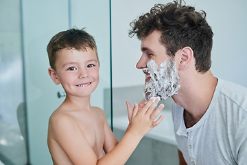 Image showing Father, child and portrait while learning to shave in bathroom, having fun or bonding. Smile, kid help and dad with shaving cream on face, playing and cleaning, hygiene and enjoying time together.