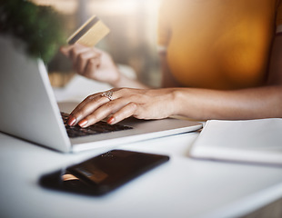 Image showing Hands, laptop and business woman with credit card for ecommerce, deal or discount in home office. Online shopping, payment and female person with debit, banking or budget planning and finance