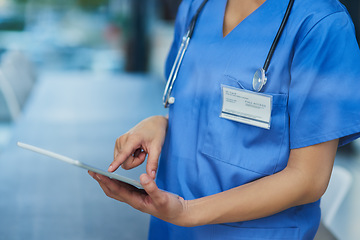 Image showing Nurse, hands and tablet, woman check digital healthcare information and technology. Female person in medicine, scroll and review health chart for diagnosis or schedule with medical staff in hospital