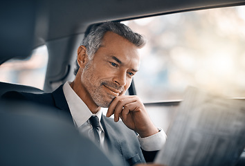 Image showing Business man, reading newspaper and car for travel, journey or drive while thinking of news. Professional male person with media paper in passenger seat for work with luxury transportation or a taxi