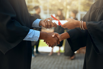 Image showing Handshake, graduation and hands with certificate at a college for education or scholarship. Support, thank you and a university graduate shaking hands with a teacher for certification and achievement