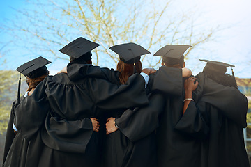 Image showing Embrace, group of graduates and together with joy on graduation day or celebrating academic achievement and outdoors. Certification, young students and hug outside or robes or hats and education