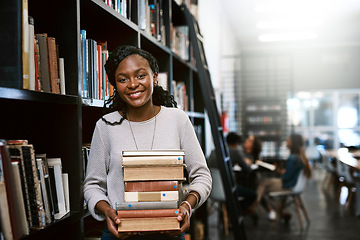 Image showing Portrait, education and black woman with books, library and university with a smile, bookshelf and studying. Face, female person or happy student with research, literature and learning with knowledge