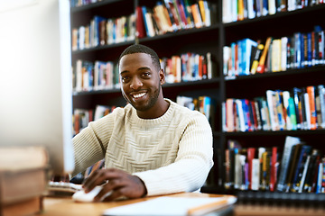 Image showing Portrait, education and black man in a library, computer or research for a project, assignment or search website for information. Face, male person or student with technology, knowledge or connection