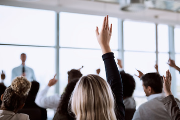 Image showing Conference, crowd and business people with hands for a question, vote or volunteering. Corporate event, meeting and hand raised in a training seminar for questions, voting or audience opinion