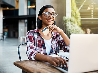 Image showing Happy woman, student and thinking on laptop with credit card for ecommerce, payment or campus loan. Female person or university learner in thought on computer for online shopping, debit or banking