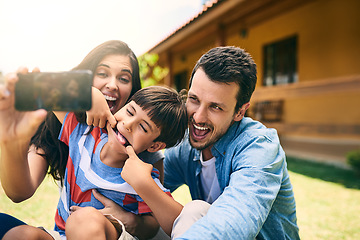 Image showing Happy family, smile and silly face for selfie, funny photo or profile picture in social media vlog outside home. Mother, father and child smiling with goofy facial expression for fun memory together