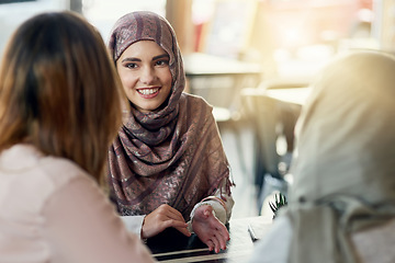 Image showing Friends, happy and Muslim women in cafe, bonding and talking together. Coffee shop, smile and Islamic girls, group or people chat, conversation and discussion for social gathering in restaurant.