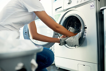 Image showing Closeup, cleaning and woman with laundry, machine and home with clothes, fabric and housekeeping. Zoom, female person and cleaner washing items, housework and laundromat with routine and service