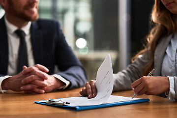 Image showing Documents, contract and business people writing signature for deal, partnership or legal paperwork in night office. Paper of lawyer woman, notary or partner hands for policy, compliance and agreement