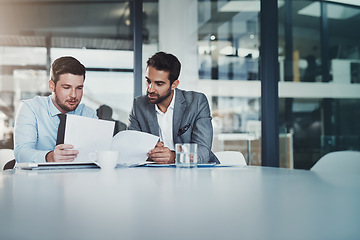 Image showing Meeting, documents and businessmen in discussion in the office boardroom planning a corporate strategy. Brainstorming, collaboration and male employees working on project with paperwork in workplace.