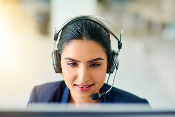 Image showing Call centre, agent and woman in headset with mic or employee on computer for consulting or customer support in the office. Operator, telemarketing and talking with customer online with advice