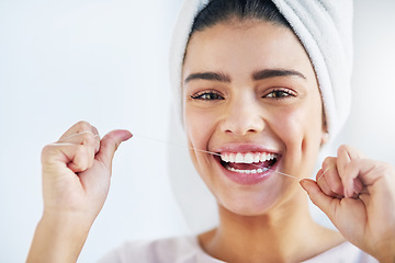 Image showing Portrait, happy and woman with floss, dental and oral health with happiness, cosmetics and fresh breath. Face, female person or girl in a bathroom, cleaning or self care with morning routine or teeth