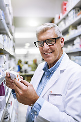 Image showing Pharmacy, medicine and smile with portrait of man in drug store for search, inspection and inventory. Medical, healthcare and pills with senior pharmacist in clinic for retail, wellness and product