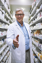 Image showing Senior man, pharmacist and handshake for introduction or greeting at a healthcare pharmacy. Portrait of happy elderly male person or medical expert shaking hands in pharmaceutical for health advice