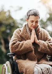 Image showing Senior woman in wheelchair, praying in garden with worship and God, disability with gratitude and faith outdoor. Spiritual female person in nature with paralysis, disabled and prayer for guidance