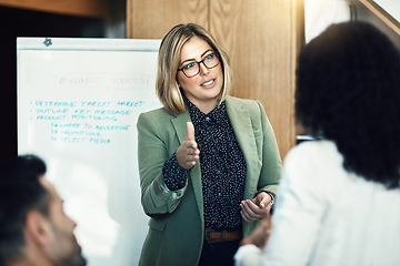 Image showing Presentation meeting, discussion and business woman brainstorming, planning and giving instruction. Project management, communication and leader speech, report or conversation with listening group