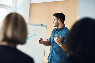 Image showing Presentation whiteboard, meeting speech and man training, coaching or teaching audience, trade show people or seminar. Event presenter, reading and male business leader talking to conference group