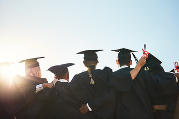 Image showing Group, students and graduation for college or university friends together with blue sky mockup. Men and women outdoor to celebrate education achievement, success and future at event for graduates