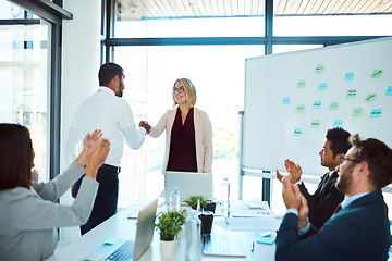 Image showing Professional, handshake and agreement in a meeting to congratulate for success and an opportunity. Presentation, applause and business people with collaboration for partnership with teamwork.