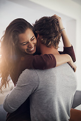 Image showing Love, passion and a couple laughing in the kitchen of their home together in the morning for romance. Funny, intimate or sexy with a man and woman in their house for romantic intimacy or bonding