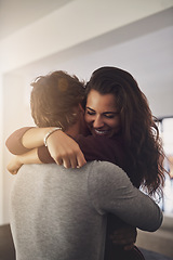 Image showing Happy woman hugging man in home for love, care and quality time together. Young couple, hug and romance of lovers in intimate relationship, special moment and smile for trust of partner in apartment