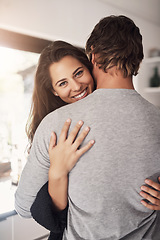 Image showing Portrait of happy woman, man and hug of love, care and quality time together for commitment to relationship at home. Young couple, smile and hugging for romance, trust and relax with partner in house