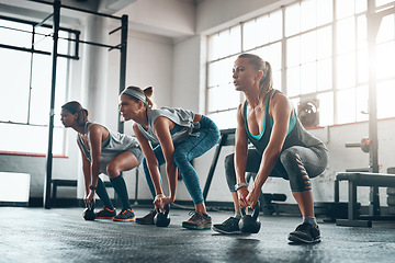 Image showing Kettlebell, group and women with fitness, exercise and progress with wellness, balance and workout goal. Female athletes, friends and girls with gym equipment, performance and sports with challenge