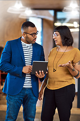 Image showing Tablet, team or business people talking in office with ideas, internet and diversity. A professional man and woman together for a creative project using online app for discussion, strategy or advice