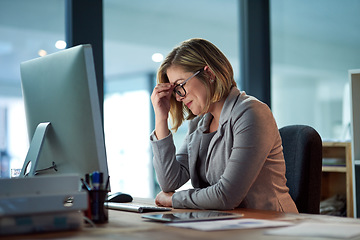 Image showing Headache, stress and business woman in office, tired or fatigue while working late at night on computer. Burnout, deadline and female worker with depression, anxiety or brain fog, sick or exhausted.