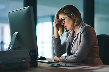 Image showing Burnout, stress and business woman in office, fatigue or tired while working late at night on computer. Headache, deadline and female worker with depression, anxiety or brain fog, sick or exhausted.