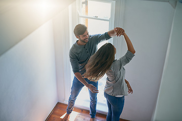 Image showing Love, couple and dance in home, top view and having fun together for romance. Dancing, happy and man and woman, bonding and affection, freedom and enjoying quality time on anniversary mockup in house