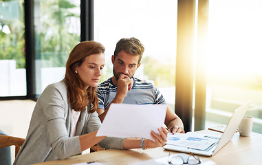 Image showing Couple, finance and budget conversation with documents planning for tax, bills and savings on laptop with banking, online payment and investment. People, financial thinking and household strategy