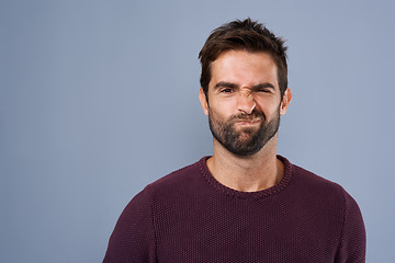 Image showing Doubt, unsure and portrait of man in studio with doubtful, uncertain and thoughtful on gray background. Thinking, mockup space and face of male person skeptical for decision, choice and question