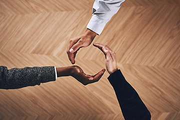 Image showing Teamwork, collaboration or hands of business people in circle for motivation, support or recycling in office. Diversity, recycle or top view of employees for goals, community or corporate partnership