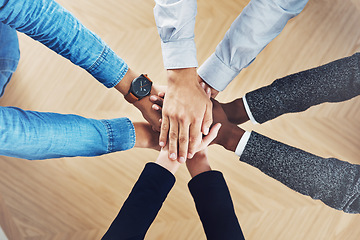 Image showing Teamwork, partnership or hands of business people in support for faith, vision or strategy in office. Above, diversity or employees in group collaboration with hope or mission for goals together