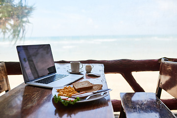 Image showing Laptop, beach or empty table at cafe for remote workspace in the morning with wifi connection. Background, internet or luxury seaside coffee shop for travel blog online with brunch meal, tea or food