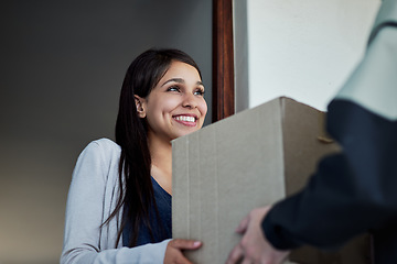 Image showing Happy, woman and courier with a package, delivery and distribution with a box, supply chain and ecommerce. Female person, customer and client with employee, worker and shipping with parcel and order