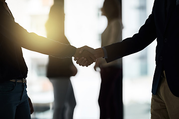 Image showing Silhouette, handshake and business people in office for partnership deal, planning and agreement. Corporate office, recruitment and workers shaking hands for welcome, communication and onboarding