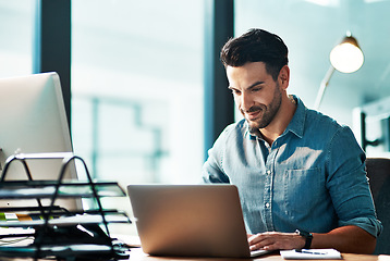 Image showing Business man, laptop and typing in office for planning strategy, online research and working at desk. Employee, computer and website connection for digital project, internet software or tech analysis