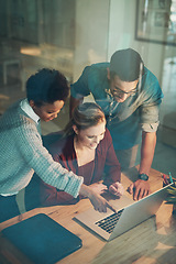 Image showing Business people, laptop and team in night for planning, strategy and project in office at seo company. Man, women and happiness for results, goal and work overtime for problem solving in workplace