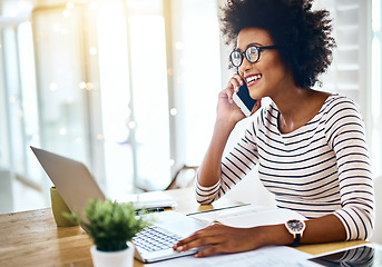 Image showing Phone call, laptop and African employee woman talking, communication and conversation in startup office. Cellphone, happy and professional entrepreneur or worker planning with contact and working