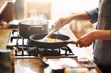 Image showing Cooking, kitchen and woman with food in a pan for lunch, dinner or supper in a modern house. Diet, wellness and closeup of a female person preparing a healthy meal in a pot on a stove at her home.