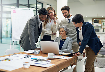 Image showing Business people, laptop or senior woman in meeting typing up ideas, strategy or planning a startup project. Mentor, team or employees in group training or coaching with leadership or vision in office