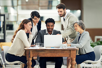 Image showing Laptop, teamwork or businessman talking in meeting for ideas, strategy or planning a startup company. People, laptop or employees in group discussion or speaking with leadership for growth in office