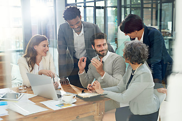 Image showing Business people, teamwork or man talking in meeting for ideas, strategy or planning a startup company. CEO, laptop or employees in group discussion or speaking with leadership for a vision in office